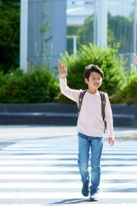 Child Walking in a Crosswalk